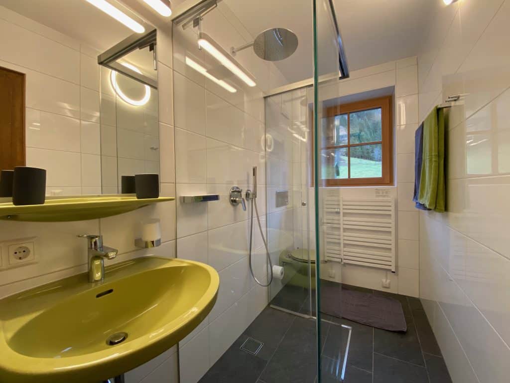 Bathroom in the Kitzstein flat with new walk-in rain shower.