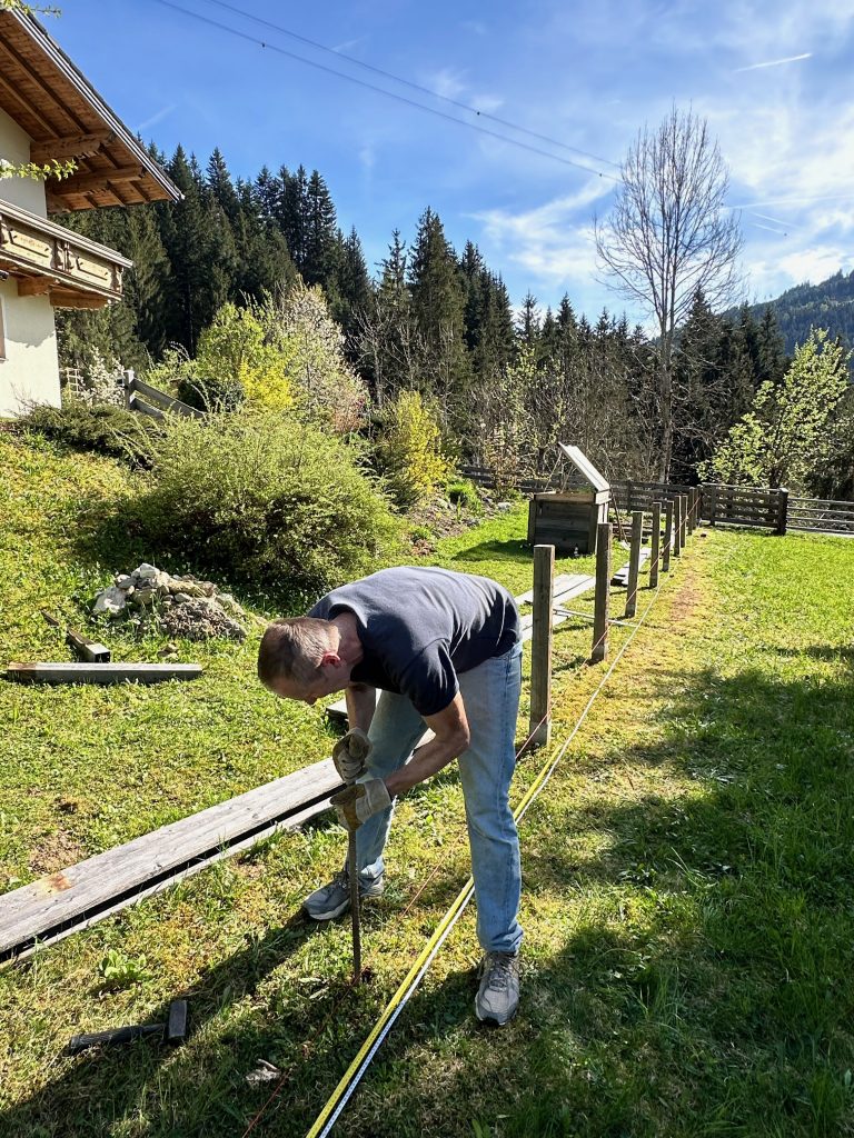 The old fence is taken down and moved