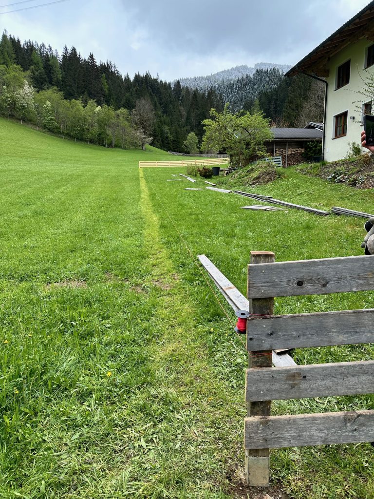 The old fence is removed and placed on the new boundary